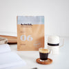 N°06 Kaffee Verpackung mit Tasse Kaffee davor